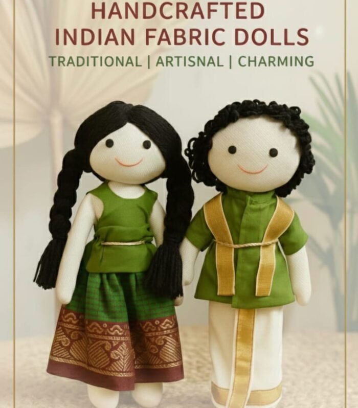 Two dolls in green Indian festive wear