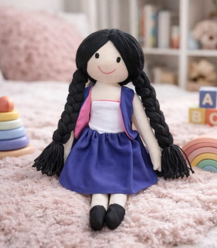 Doll in white and blue dress