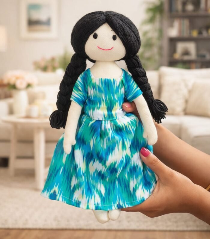 Doll in blue dress